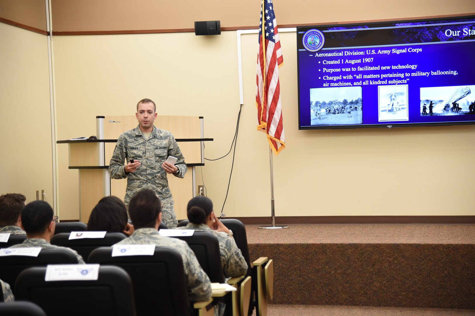 U.S. Air Force Tech. Sgt. Michael Furger, noncommissioned officer in charge of source collection management, teaches Offutt Air Force Base, Neb., junior-enlisted military members about U.S. Air Force history during the inaugural Junior Enlisted Professional Development Seminar, July 19, 2018. During the seminar, junior-enlisted members discussed a variety of topics with USSTRATCOM non-commissioned officers, petty officers and senior leaders. Topics included leadership, junior-enlisted roles and responsibilities, mentoring, military traditions and history, educational benefits, and customs and courtesies. USSTRATCOM has global responsibilities assigned through the Unified Command Plan that include strategic deterrence, nuclear operations, space operations, joint electromagnetic spectrum operations, global strike, missile defense, and analysis and targeting.