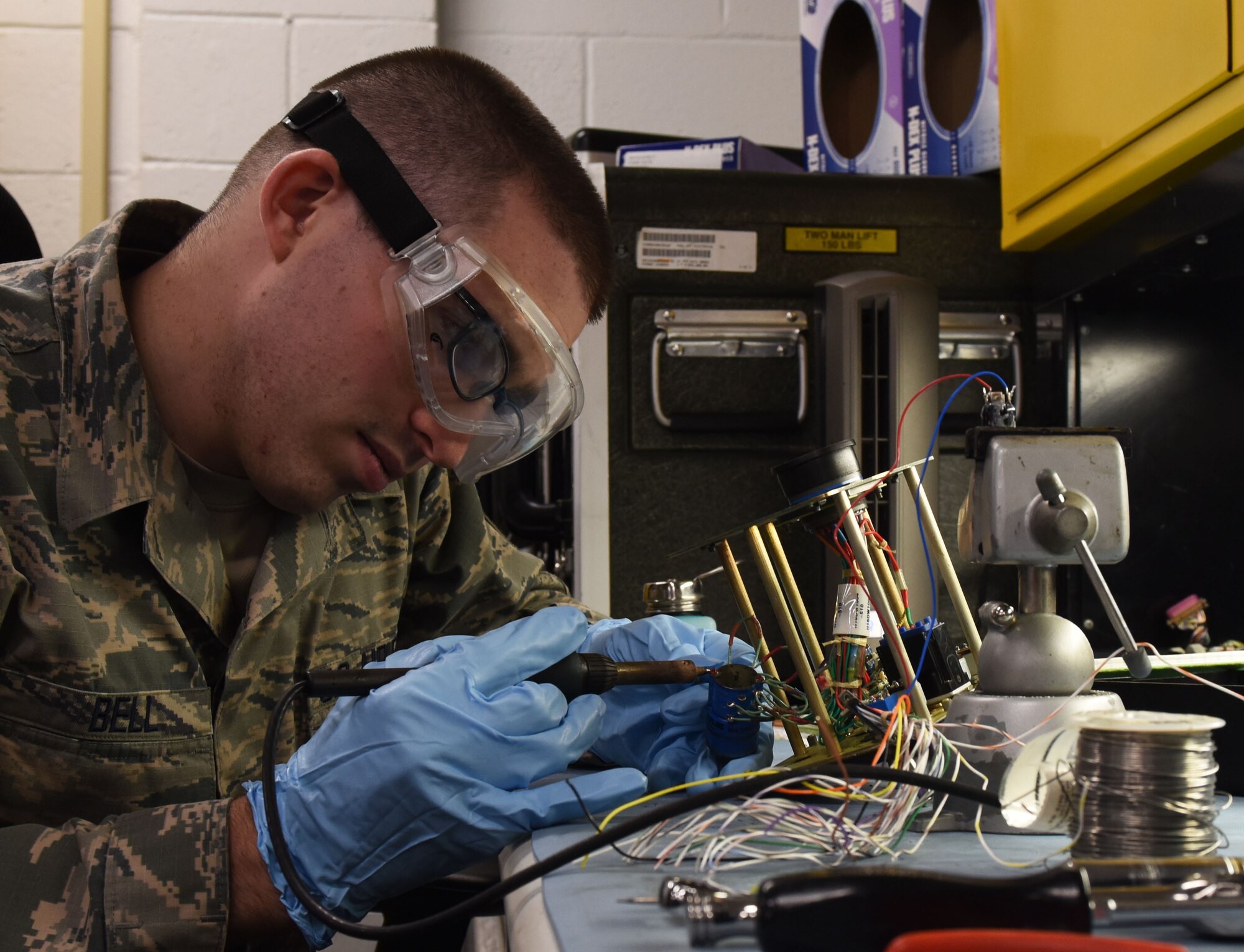 U.S. Air Force Staff Sgt. Ryan Bell, 20th Civil Maintenance Squadron avionics system technician, works on an avionics power panel at Shaw Air Force Base, S.C., July 23, 2018.