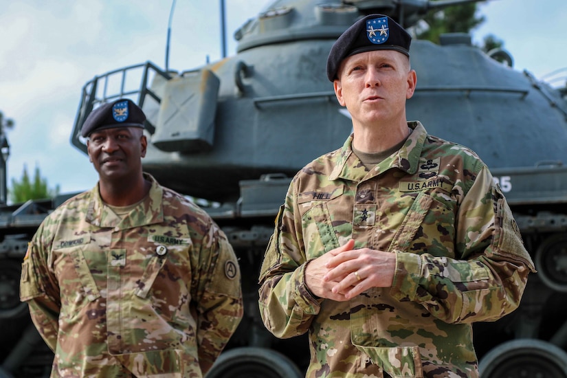 Maj. Gen. David C. Hill, deputy commanding general, U.S. Army Central, speaks to the audience during an award ceremony to honor Col. Oscar W. Doward Jr., outgoing commander of the 2503rd Digital Liaison Detachment, before a change-of-command ceremony July 19, 2018, at USARCENT headquarters on Shaw Air Force Base, S.C. (U.S. Army photo by Sgt. Von Marie Donato)