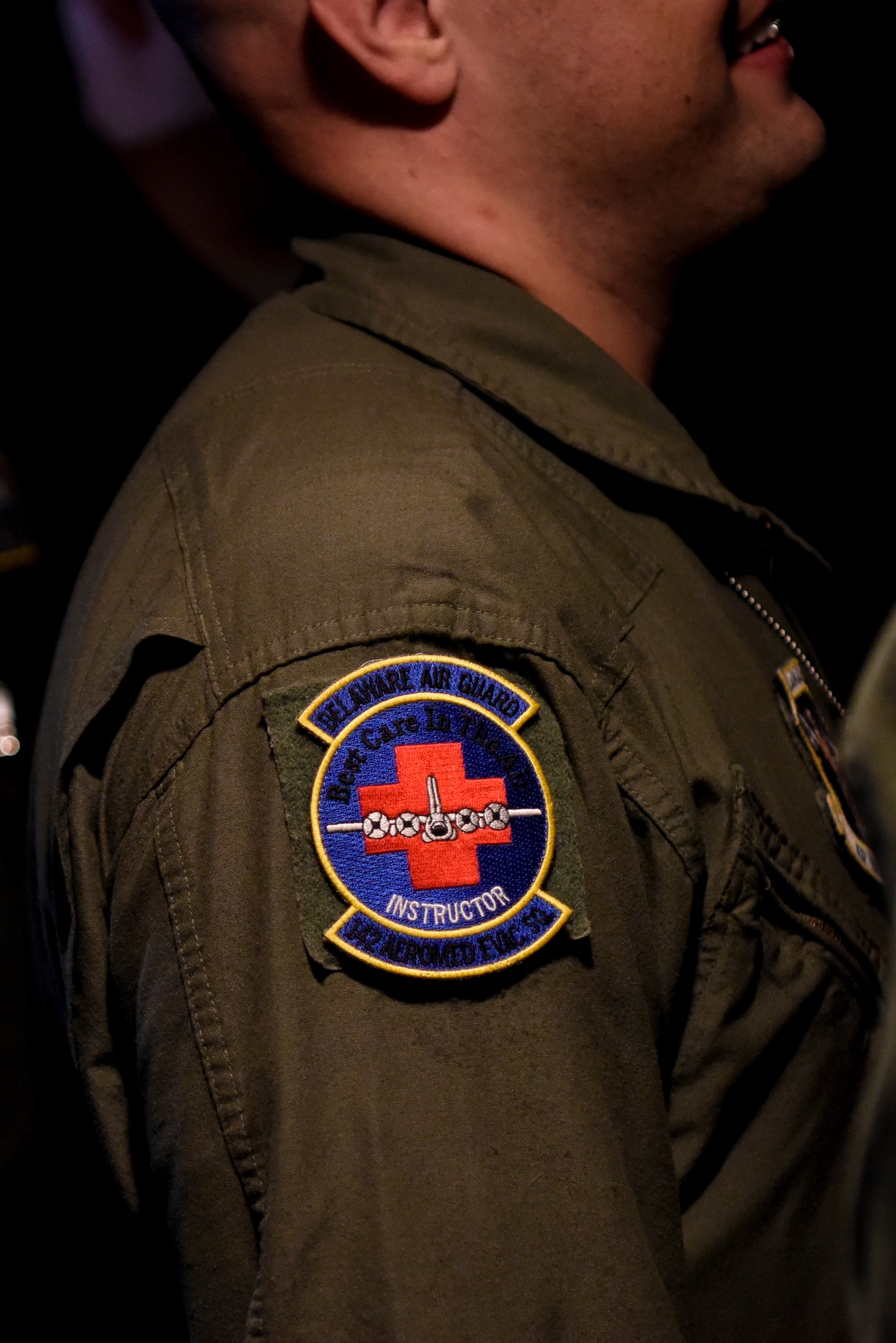 Master Sgt. Bryan Florian, Delaware Air National Guard 142nd Aeromedical Evacuation Squadron flight medic, participates in aeromedical evacuation training July 12, 2018, at Dover Air Force Base, Del. Aeromedical evacuation crews can turn any Air Force aircraft into a flying ambulance by the essential equipment they carry with them wherever they go. The 142nd AES is stationed at New Castle Air National Guard Base, Del. (U.S. Air Force photo by Airman 1st Class Zoe M. Wockenfuss)