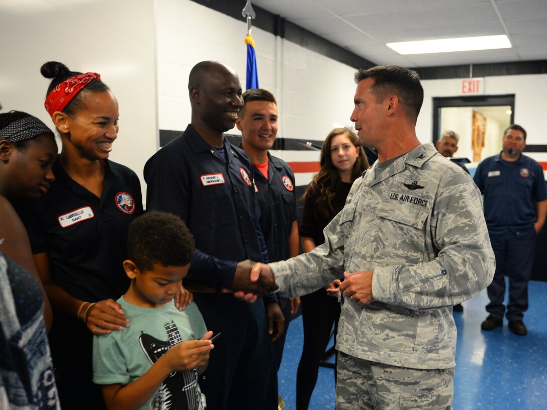 Col. Charlie Velino, 47th Flying Training Wing commander, shakes the hands of the graduates of the Air Force’s Pathways Program, at Laughlin Air Force Base, Texas, July 13, 2018. Formed and designed after the GS Palace Acquire Program in 2015, representatives within Air Education and Training Command developed the service’s first wage grade internship program as a way to assist in rectifying the decline in qualified aircraft maintenance personnel, noted in data collected from a 2014 career field study. (U.S. Air Force photo by Senior Airman Benjamin N. Valmoja
