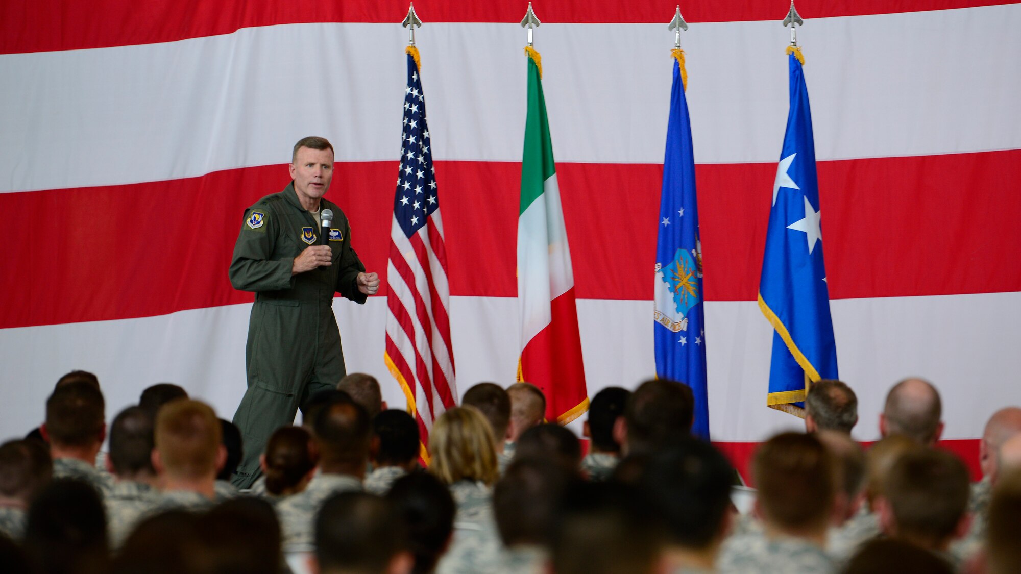 Gen. Tod D. Wolters, U.S. Air Forces in Europe and Air Forces Africa commander, speaks with Airmen at an all call during his visit to Aviano Air Base, Italy, July 23, 2018. Wolters met with Team Aviano members to express his gratitude for the hard work and dedication the wing gives toward defending U.S. and NATO interests and to remind Airmen to take time for themselves and their families. (U.S. Air Force photo by Staff Sgt. Cary Smith)