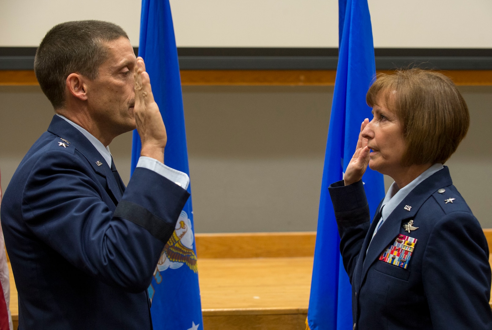 Maj. Gen. Robert Skinner, Air Forces Cyber commander, administers the Oath of Office to Brig. Gen. Michelle Hayworth, AFCYBER vice commander, during her promotion ceremony at Joint Base San Antonio-Lackland July, 16. In June, Hayworth re-joined AFCYBER from Air Force Space Command. She previously served in AFCYBER, most recently as the 688th Cyberspace Wing Commander.