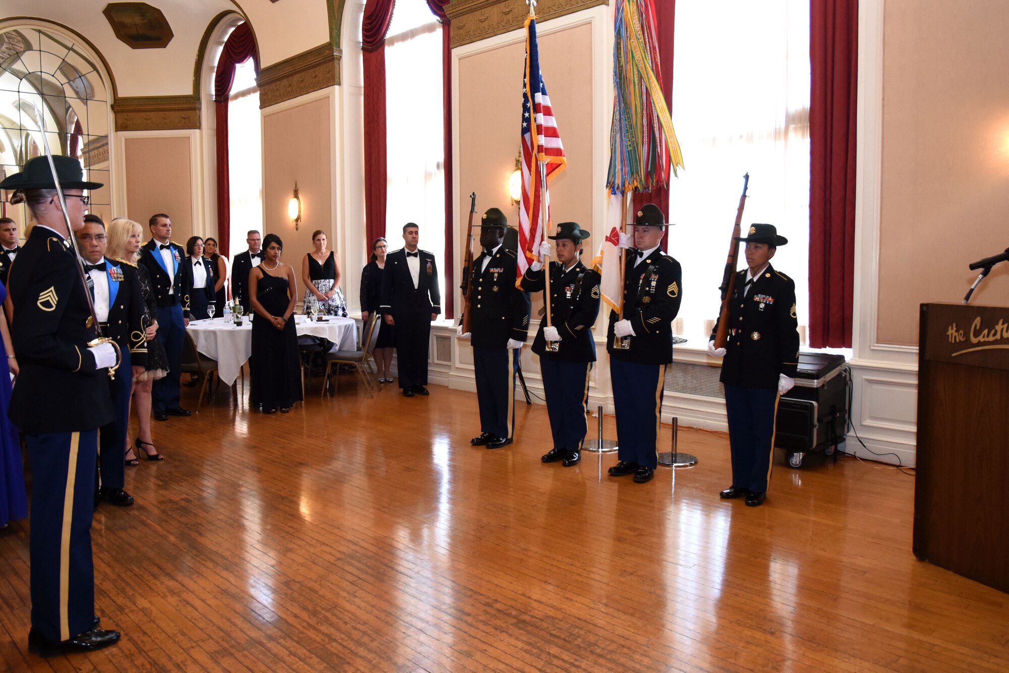 The 344th Military Battalion Color Guard mark the beginning of the centennial celebration by posting the colors at the Cactus Hotel, San Angelo, Texas, July 20, 2018. This color guard was comprised of drill instructors recently re-introduced to soldiers going through advanced individual training on Goodfellow Air Force Base, Texas. (U.S. Air Force photo by Airman 1st Class Seraiah Hines/Released)