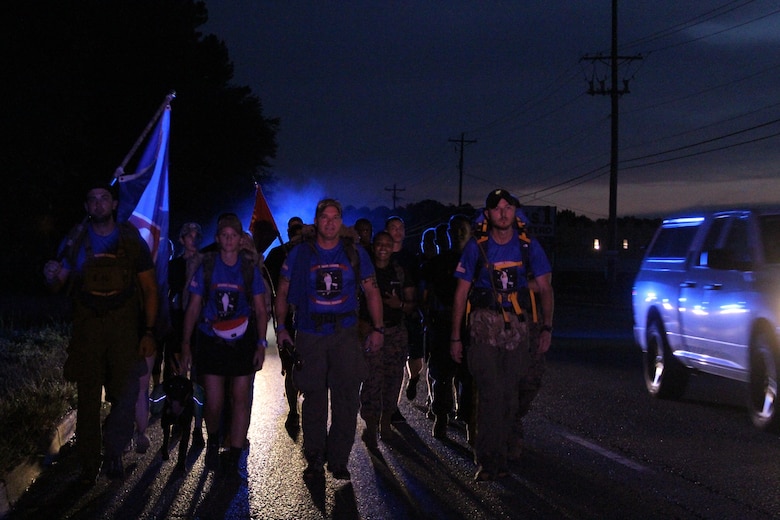 The Rucking Raiders were joined by Marine Corps Recruiting Station Columbia during their Marine Raider March on a portion of the 900 mile ruck on July 21, 2018, as they passed through Columbia, S.C. Marines and future Marines from RS Columbia joined the ruckers for 8 miles of their journey, to honor service members who lost their lives in a aircraft crash a year ago. To support the march, follow the Marine Raider Memorial March on Facebook and visit their website at http://www.ruckingraiders.com. (U.S. Marine Corps photo by Sgt. Tabitha Bartley)