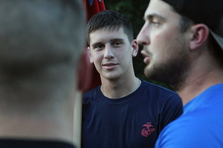 William Christianson, poolee, RSS Columbia, listens to one of the ruckers for the Marine Raider March talk about his experience in the Marine Corps before embarking on a portion of the 900 mile ruck on July 21, 2018, as they passed through Columbia, S.C. Marines and poolees joined the ruckers for 8 miles of their journey to honor service members who lost their lives in a aircraft crash a year ago. To support the march, follow the Marine Raider Memorial March on Facebook and visit their website at http://www.ruckingraiders.com. (U.S. Marine Corps photo by Sgt. Tabitha Bartley)