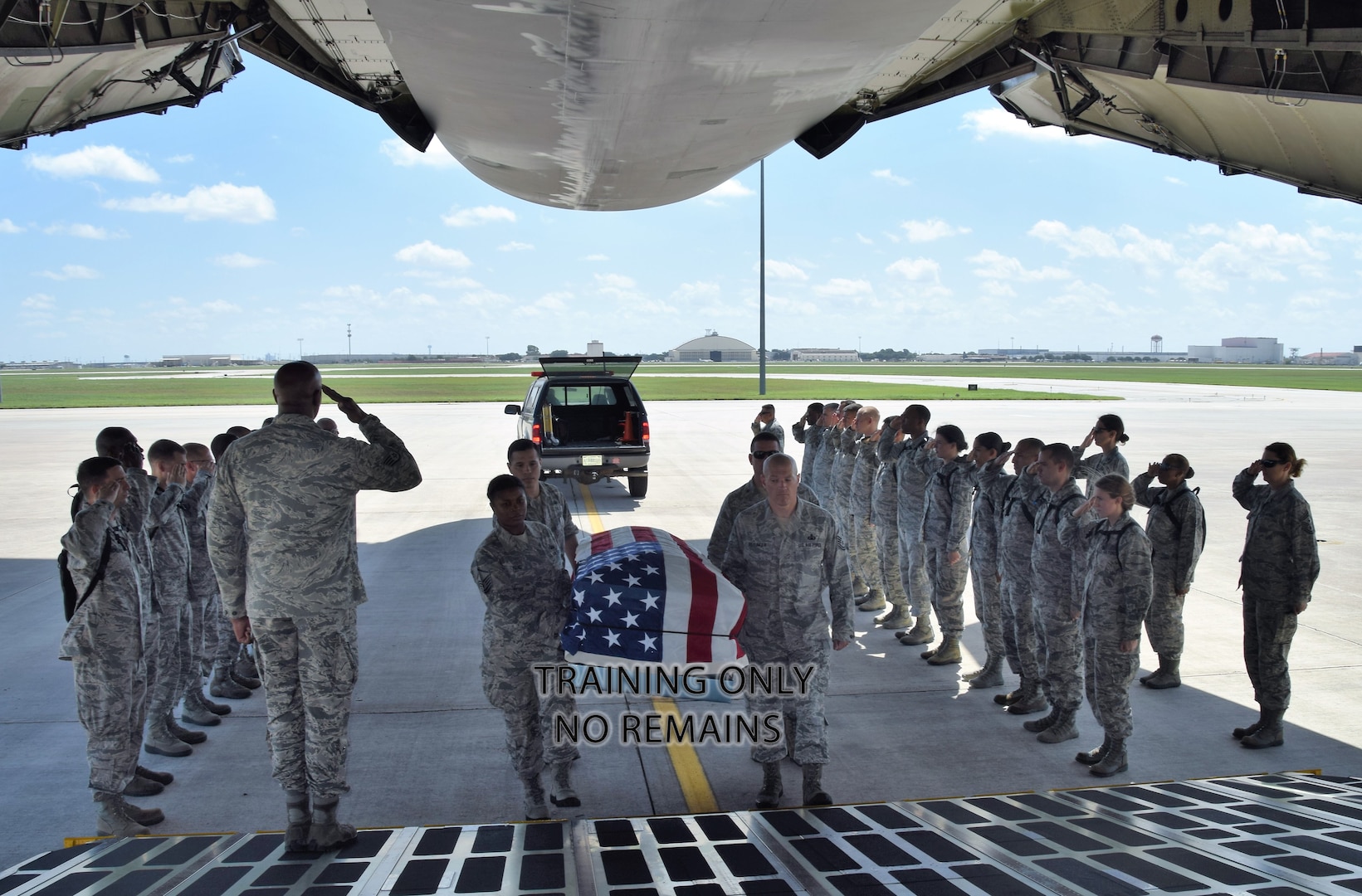 Citizen Airmen perform a mock dignified transfer of remains aboard a C-5M Super Galaxy at Joint Base San Antonio-Lackland July 14. The training was for Reserve Citizen Airmen chaplain candidates. The candidates are with the Air Force Chaplain Candidate Program, who after graduation and an ecclesiastical endorsement, are then eligible to become chaplains in the U.S. Air Force Reserve, Air National Guard or active duty component.