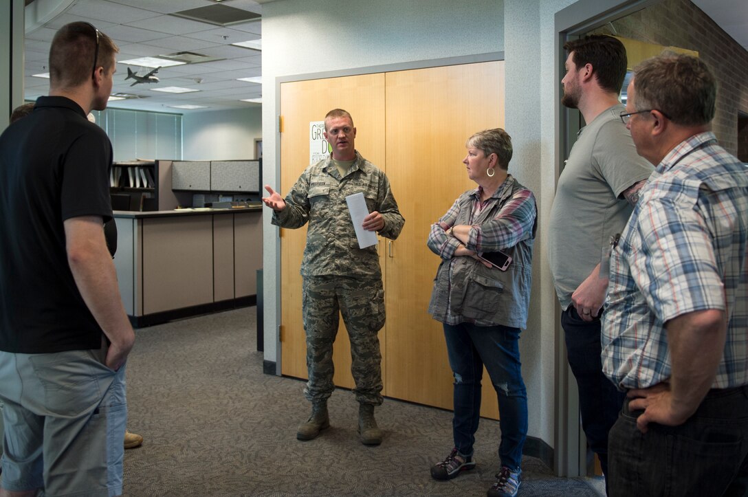 U.S. Air Force Airmen from the 133rd Airlift Wing and 148th Fighter Wing speak to members of the Minnesota Congressional Delegation staff in St. Paul, Minn., July 17, 2018.