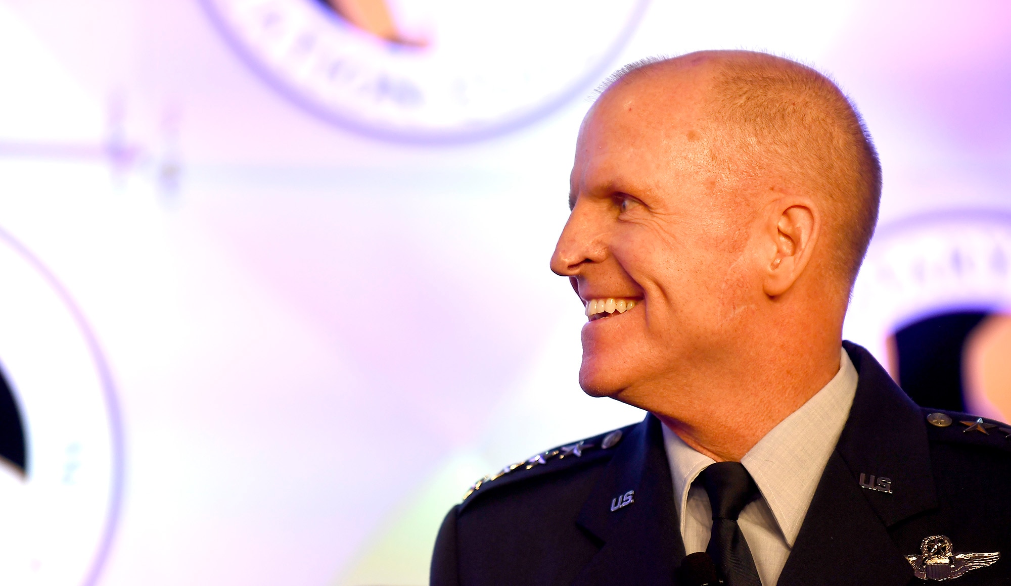 Air Force Vice Chief of Staff Gen. Stephen W. Wilson smiles during the Military Child Education Coalition National Training Seminar in Washington, D.C., July 24, 2018. The Air Force has continuously placed an emphasis on school age dependent education because of a direct correlation with family resilience to maintain a willingness of families to continue to support their Airman sponsors wherever they are asked to serve. (U.S. Air Force photo by Staff Sgt. Rusty Frank)