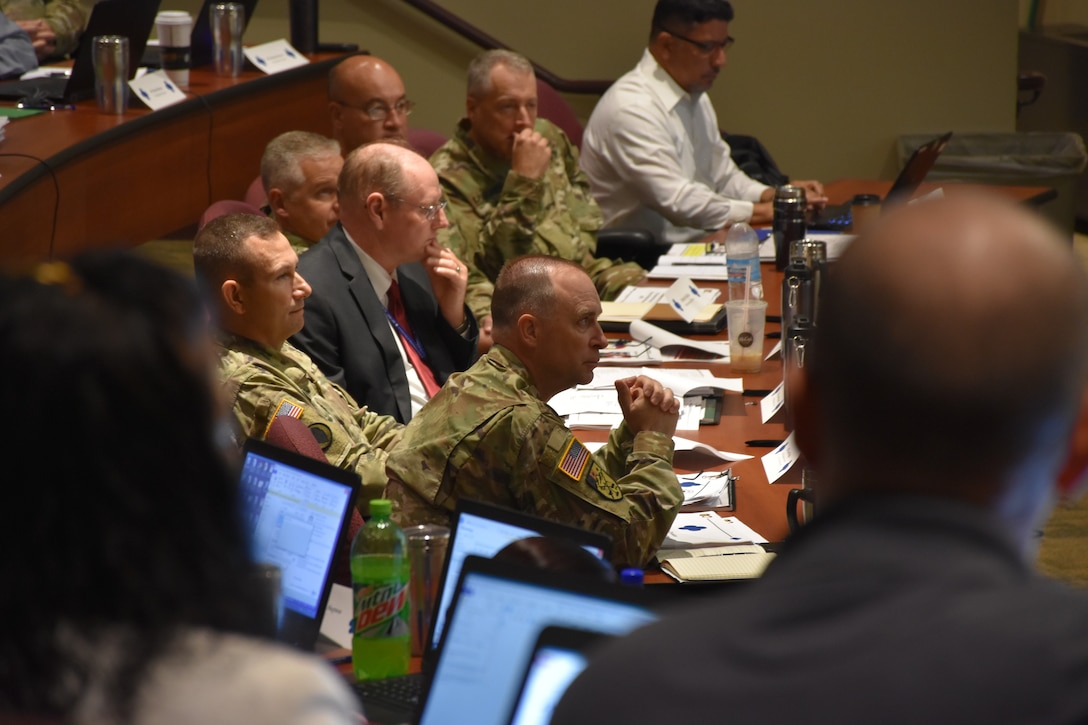 Maj. Gen. Patrick J. Reinert, 88th Readiness Division commanding general, listens to discussions between the 88th RD command team along with the command teams of the 81st Readiness Division and U.S. Army Reserve Command, as well as key staff from the 63rd RD and 99th RD, during the annual Mission Readiness Review (MR2) at the 88th RD headquarters on Fort McCoy, Wis., July 11 and 12.