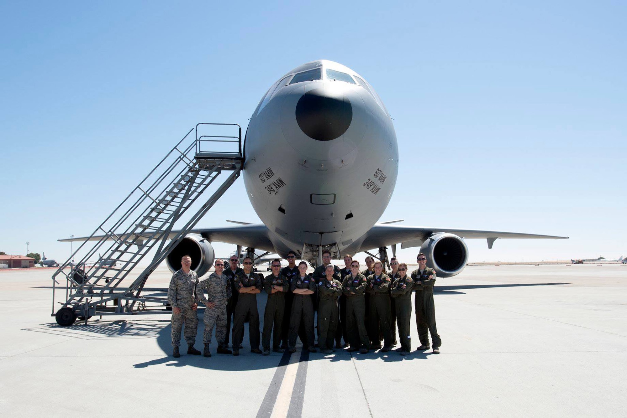 A 349th Air Mobility Wing KC-10 Extender aircrew poses for a photo at Travis Air Force Base, Calif., before departing for the Experimental Aircraft Association's AirVenture 2018, at Wittman Regional Airport in Oshkosh, Wis., July 24, 2018.