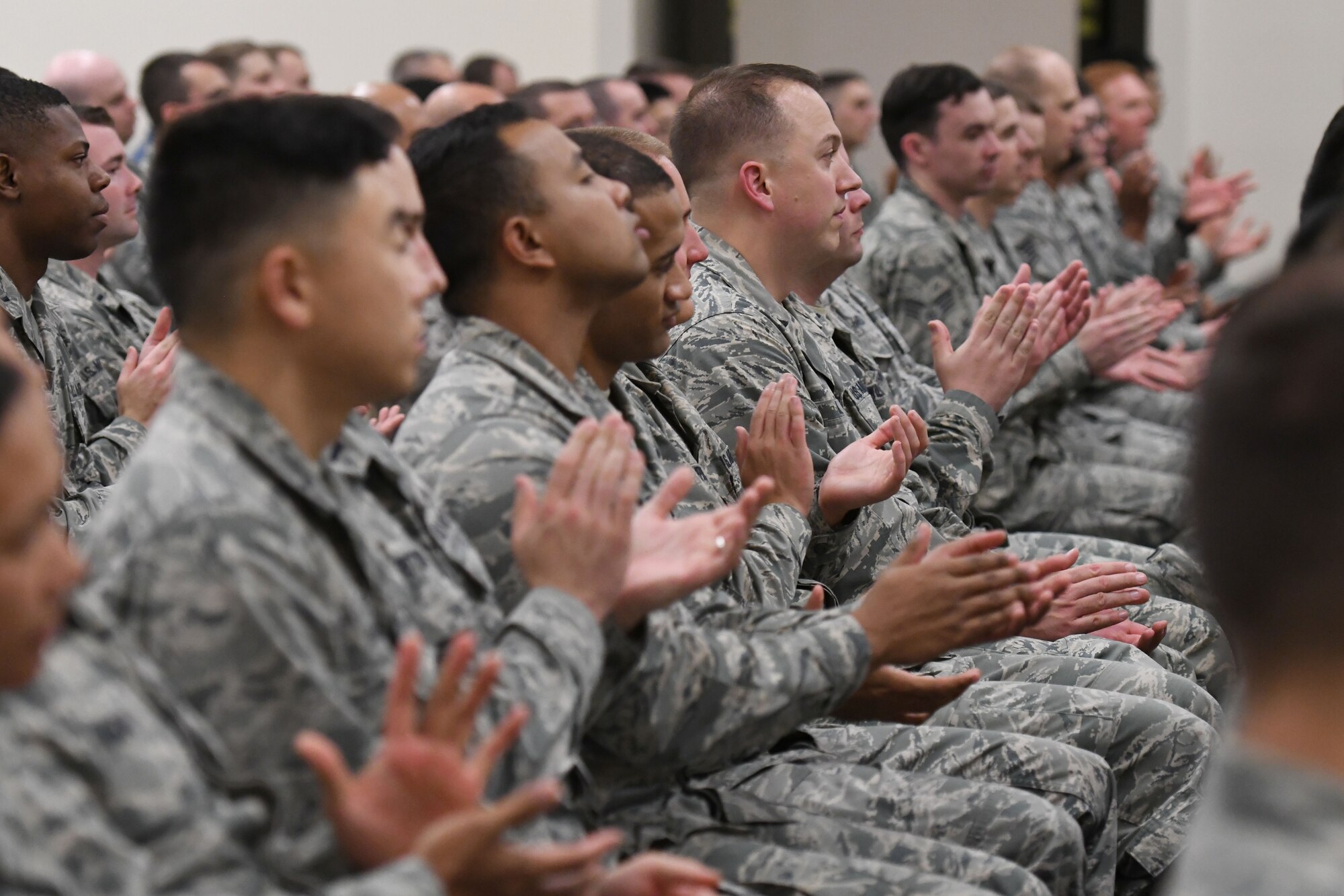 Airmen in the 333rd Training Squadron attend the 333rd TRS change of command ceremony in the Roberts Consolidated Aircraft Maintenance Facility at Keesler Air Force Base, Mississippi, July 24, 2018. U.S. Air Force Lt. Col. Andrew Miller, incoming 333rd TRS commander, assumed command from Lt. Col. Nathaniel Huston, outgoing 333rd TRS commander. (U.S. Air Force photo by Kemberly Groue)