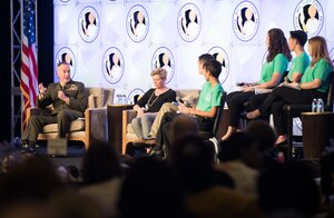 Chairman of the Joint Chiefs of Staff Marine Corps Gen. Joe Dunford and his wife, Ellyn Dunford, take part in a panel discussion.