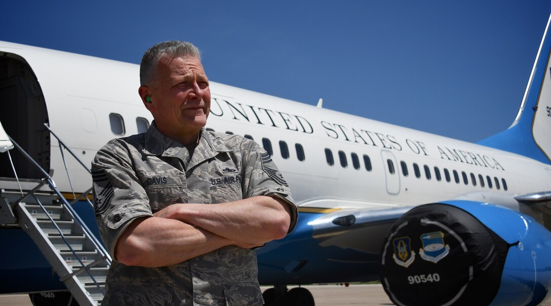 Ready to serve and keep the flying mission on track, Chief Master Sgt. John Davis knows jets and their engines. When Davis isn't at the 932nd Maintenance Group, helping train new reservists on C-40 jet engines, he is an assistant professor of aviation technology at Purdue University. The two positions complement each other.  During his 15 years on active duty, Davis worked on engines powering F-4 Phantoms, F-15 Eagles, C-130s, and a variety of other Air Force aircraft while he was assigned to Edwards Air Force Base, Calif. He was an instructor at Chanute Air Force Base in Illinois for eight years and taught courses in airframe and power plant. Davis joined the Air Force in 1978 and said he plans to continue serving at the 932nd Maintenance Group as a traditional reservist. "I still love what I'm doing," he said.  (U.S. Air Force photo by Lt. Col. Stan Paregien)