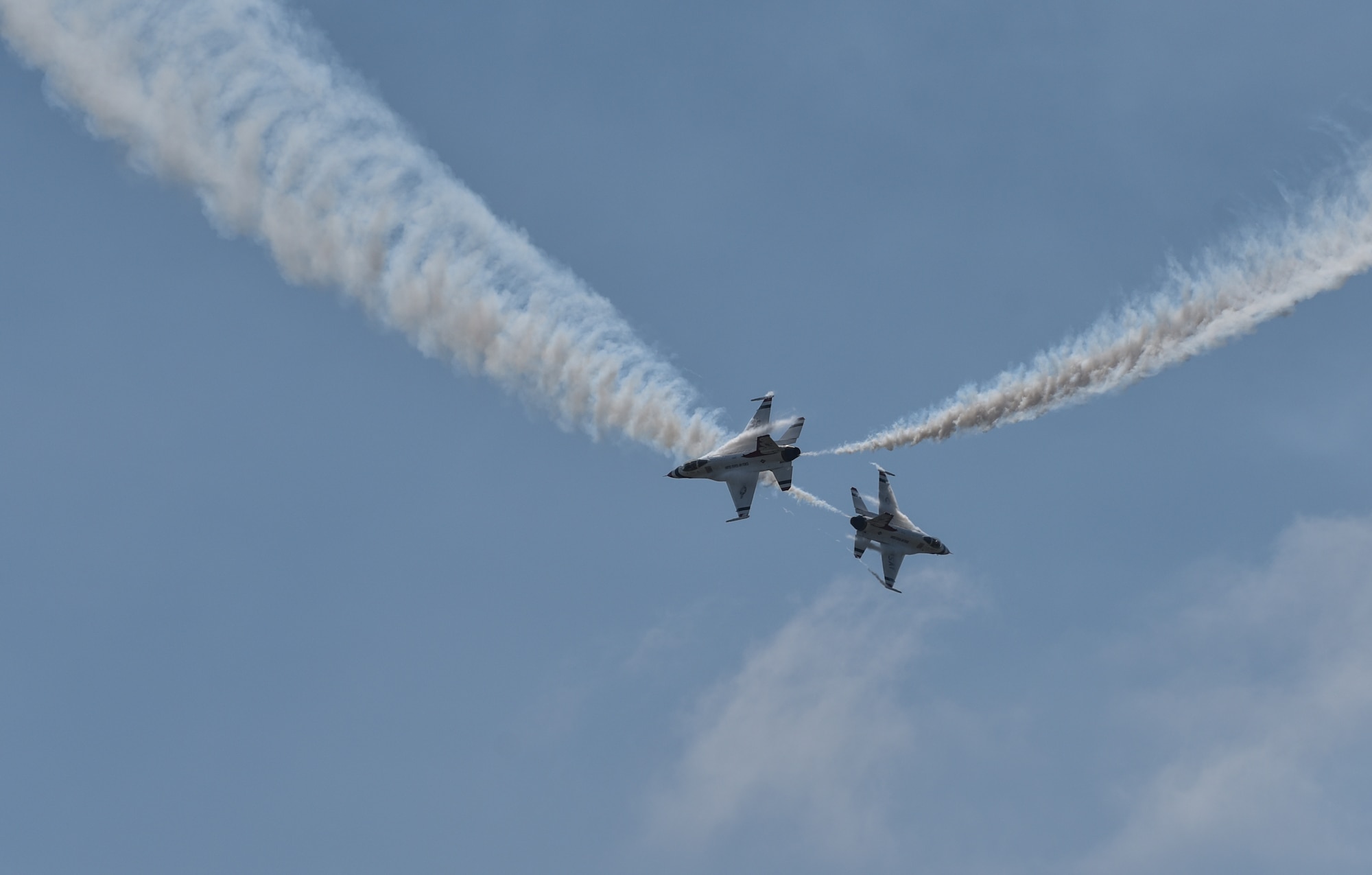 The U.S. Air Force Thunderbirds perform aerial acrobatics during Cheyenne Frontier Days in Cheyenne Wyo., July 25, 2018. The 3600th Air Demonstration unit, the official Air Force Air Demonstration team, was activated May 25, 1953. The unit adopted the name “Thunderbirds,” influenced in part by the strong Native American culture and folklore from the southwestern United States where Luke Air Force Base, Arizona, is located. The airshow provides a chance for the local community and worldwide visitors of CFD to see the U.S. Air Force in action over the skies of Cheyenne. (U.S. Air Force photo by Airman 1st Class Braydon Williams)