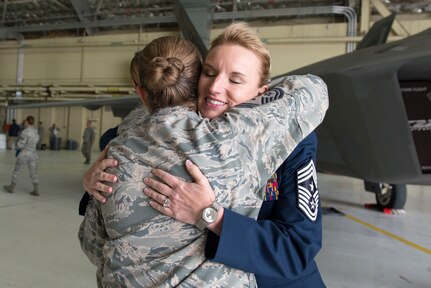 Friends, family, colleagues, and invited guests attend the retirement ceremony for Air Force Chief Master Sgt. Gay L.C. Veale, held at Hangar 1, Joint Base Elmendorf-Richardson, Alaska, July 20, 2018. Chief Veale retired after 30 years of exemplary and faithful service.