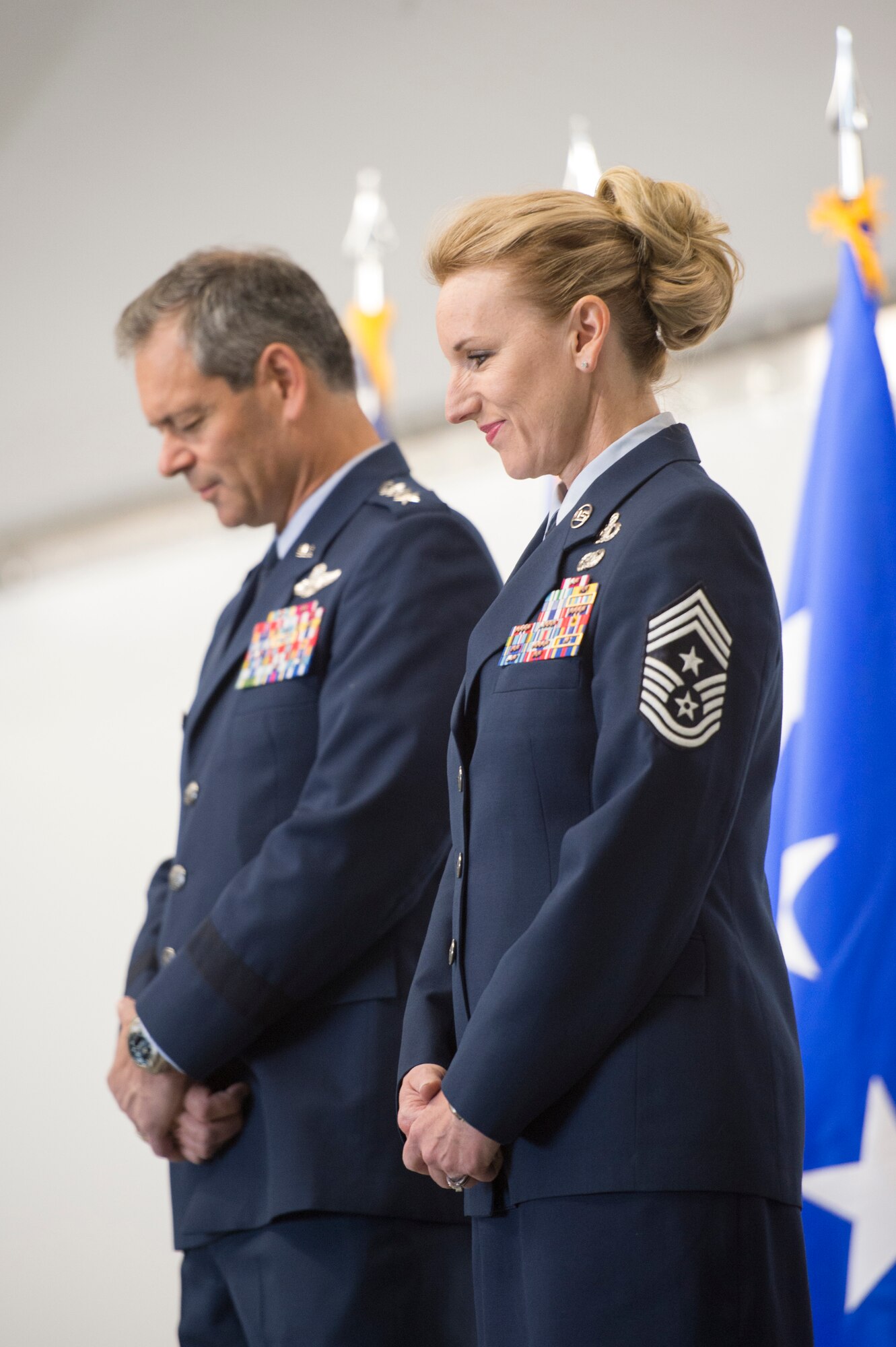 Friends, family, colleagues, and invited guests attend the retirement ceremony for Air Force Chief Master Sgt. Gay L.C. Veale, held at Hangar 1, Joint Base Elmendorf-Richardson, Alaska, July 20, 2018. Chief Veale retired after 30 years of exemplary and faithful service.