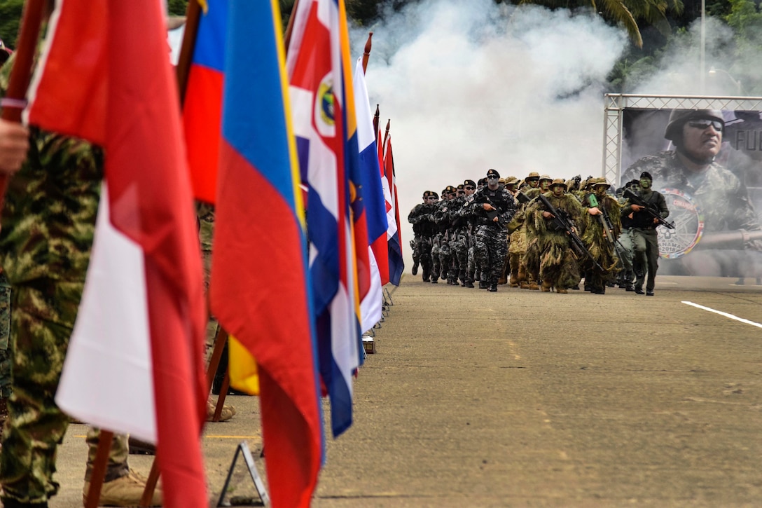 Members of Panamas police force march during the Fuerzas Comando 2018 opening ceremony.