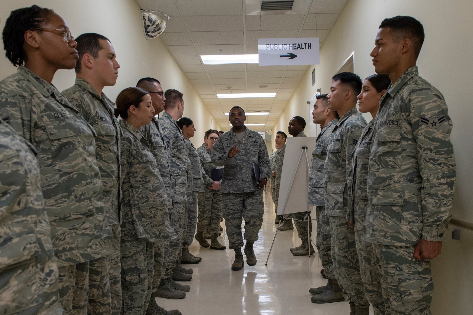 Col. Otis C. Jones, 374th Airlift Wing commander, places the Airmen of the 374th Aerospace Medicine Squadron at ease during a 374th Medical Group immersion tour at Yokota Air Base, Japan, July 24, 2018.