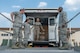 The Airmen from the 374th Medical Support Squadron demonstrate the capability of the En Route Patient Staging System for Otis C. Jones, 374th Airlift Wing commander, during the 374th Medical Group immersion tour at Yokota Air Base, Japan, July 24, 2018.