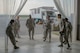 Col. Otis C. Jones walks with the leadership of the 374th Medical Group after an En Route Patient Staging System demonstration during the 374 MDG immersion tour at Yokota Air Base, Japan, July 24, 2018.