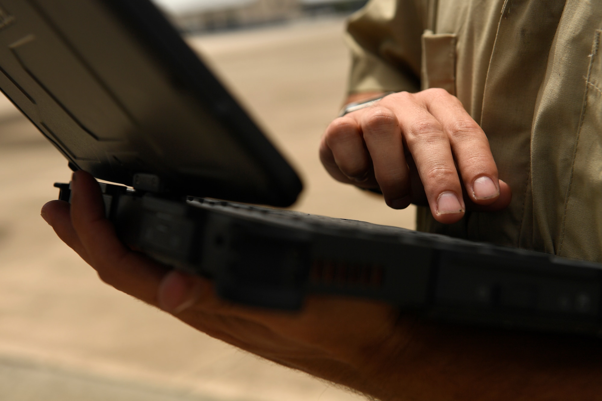 U.S. Air Force Tech. Sgt. Jason Smigelski, 145th Aircraft Maintenance Squadron (AMXS), references his technical order on the proper procedures for towing a C-17 Globemaster III aircraft at the the North Carolina Air National Guard Base, Charlotte Douglas International Airport, July 24, 2018. Since the aircraft conversion in April, the 145th AMXS is working to train maintenance personnel with a goal of them being fully qualified.