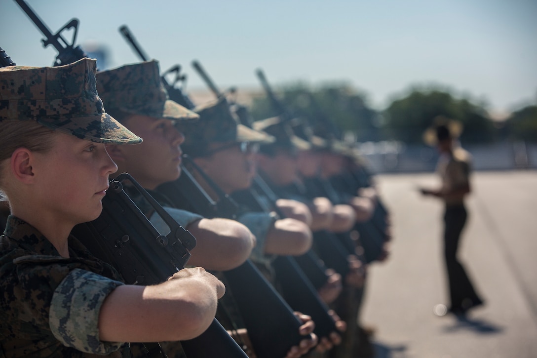 U.S. Marine Corps recruits with Platoon 4036, Oscar Company, 4th Recruit Training Battalion, execute a drill movement during Initial Drill at Peatross Parade Deck on Marine Corps Recruit Depot Parris Island, S.C., July 23, 2018. The recruits are scored for initial drill according to confidence, attention to detail, and discipline.