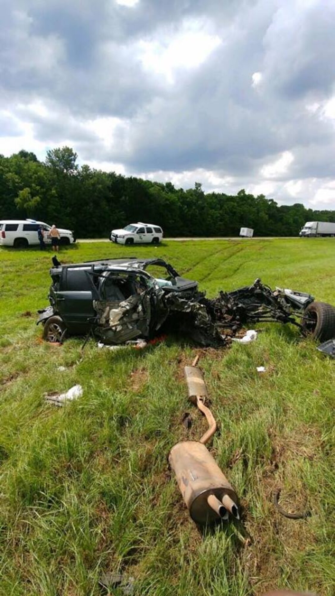 Wreckage from a vehicle litters the median of Interstate-49 after an accident outside Opelousas, Louisiana, May 24, 2018.  The vehicle hit a semitractor trailer going northbound. The driver, Jason Hesni, sustained life-threatening injuries. U.S. Air Force Chief Master Sgt. Shelley Cohen, 307th Bomb Wing command chief, happened upon the scene, administering first-aid and saving Hesni’s life. (courtesy photo)