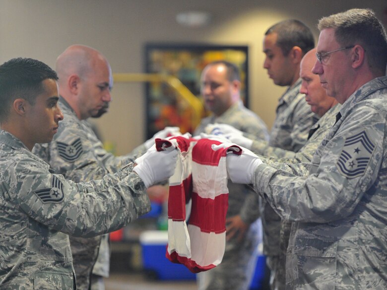 A six-person honor guard, made up of volunteer 910th Airlift Wing Reserve Citizen Airmen and Ohio Air National Guard Airmen, demonstrated a funeral honors ceremony July 25, 2018, during a Ohio Air National Guard Enlisted Leadership Symposium that was held in the Community Activity Center on Youngstown Air Reserve Station.