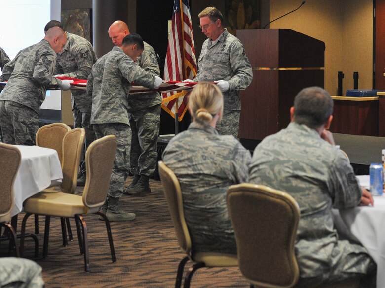 A six-person honor guard, made up of volunteer 910th Airlift Wing Reserve Citizen Airmen and Ohio Air National Guard Airmen, demonstrated a funeral honors ceremony July 25, 2018, during a Ohio Air National Guard Enlisted Leadership Symposium that was held in the Community Activity Center on Youngstown Air Reserve Station.
