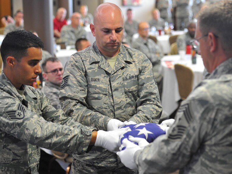 A six-person honor guard, made up of volunteer 910th Airlift Wing Reserve Citizen Airmen and Ohio Air National Guard Airmen, demonstrated a funeral honors ceremony July 25, 2018, during a Ohio Air National Guard Enlisted Leadership Symposium that was held in the Community Activity Center on Youngstown Air Reserve Station.
