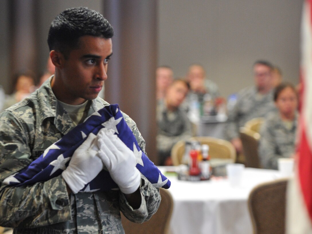 A six-person honor guard, made up of volunteer 910th Airlift Wing Reserve Citizen Airmen and Ohio Air National Guard Airmen, demonstrated a funeral honors ceremony July 25, 2018, during a Ohio Air National Guard Enlisted Leadership Symposium that was held in the Community Activity Center on Youngstown Air Reserve Station.