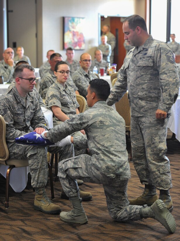 A six-person honor guard, made up of volunteer 910th Airlift Wing Reserve Citizen Airmen and Ohio Air National Guard Airmen, demonstrated a funeral honors ceremony July 25, 2018, during a Ohio Air National Guard Enlisted Leadership Symposium that was held in the Community Activity Center on Youngstown Air Reserve Station.