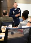 Lt. Gen. Lee K. Levy II, front, speaks at an event June 28 after being introduced by Daniel Pullin, dean of the University of Oklahoma Price College of Business. He was the inaugural speaker of a distinguished speaker series hosted at the Gene Rainbolt Graduate School of Business. His lecture centered on the theme of “Intersection of Innovation + Armed Services.”