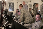 Airmen with the Wisconsin National Guard’s 128th Air Control Squadron train on the AN/TYQ-23A Tactical Air Operations Module (TAOM) command and control platform at Volk Field, Wis., June 13, 2018. The TAOM replaced the decades-old AN/TYQ-23 modular control equipment (MCE) operations module, providing the 128th ACS with increased capabilities as they conduct missions.