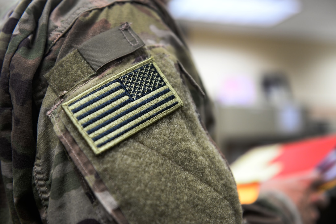 With the new Operational Camouflage Pattern, or OCP, uniforms rolling into service Air Force-wide in October 2018,  the uniform patches to go with them will be rolling in as well. Before units spend money and time on patches during the transition, many experts are advising to double-check before the final call is made. (U.S. Air Force photo by Senior Airman Benjamin N. Valmoja)