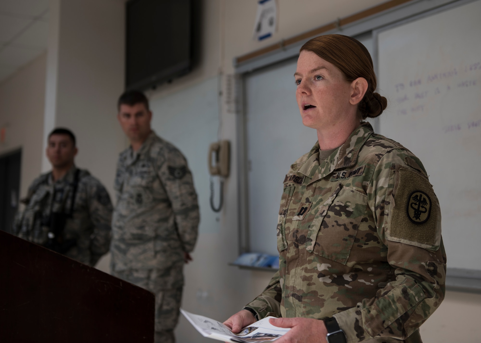 U.S. Army Capt. Alexandria Argue, 39th Medical Group veterinarian, briefs members of the 39th Security Forces Squadron during guard mount at Incirlik Air Base, Turkey, July 26, 2018.