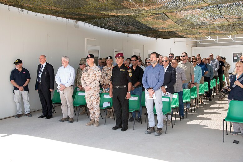 The multi-national audience for the Mosul Dam Task Force change of command ceremony included government officials from Iraq, Italy and the United States. From left, Mr. Riyadh, Ministry of Water Resources; Howard Stickley, Director of Programs and Business, Transatlantic Division; Col. Settesoldi, Commander, Task Force Presidium; Col. Muntadar, Iraq; and Mr. Miconi, Project Manager, Trevi.