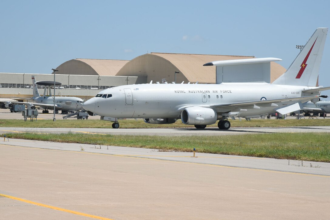 A crew from the Royal Australian Air Force flew one of their E-7A "Wedgetail" AEW&C (Airborne Early Warning and Control) aircraft into Tinker July 13. Wing Commander Mike "Mango" Bowen met with the 552nd Air Control Wing Director of Staff Lt. Col. Brian Donehue to discuss with reporters their new exchange program between the two wings.
