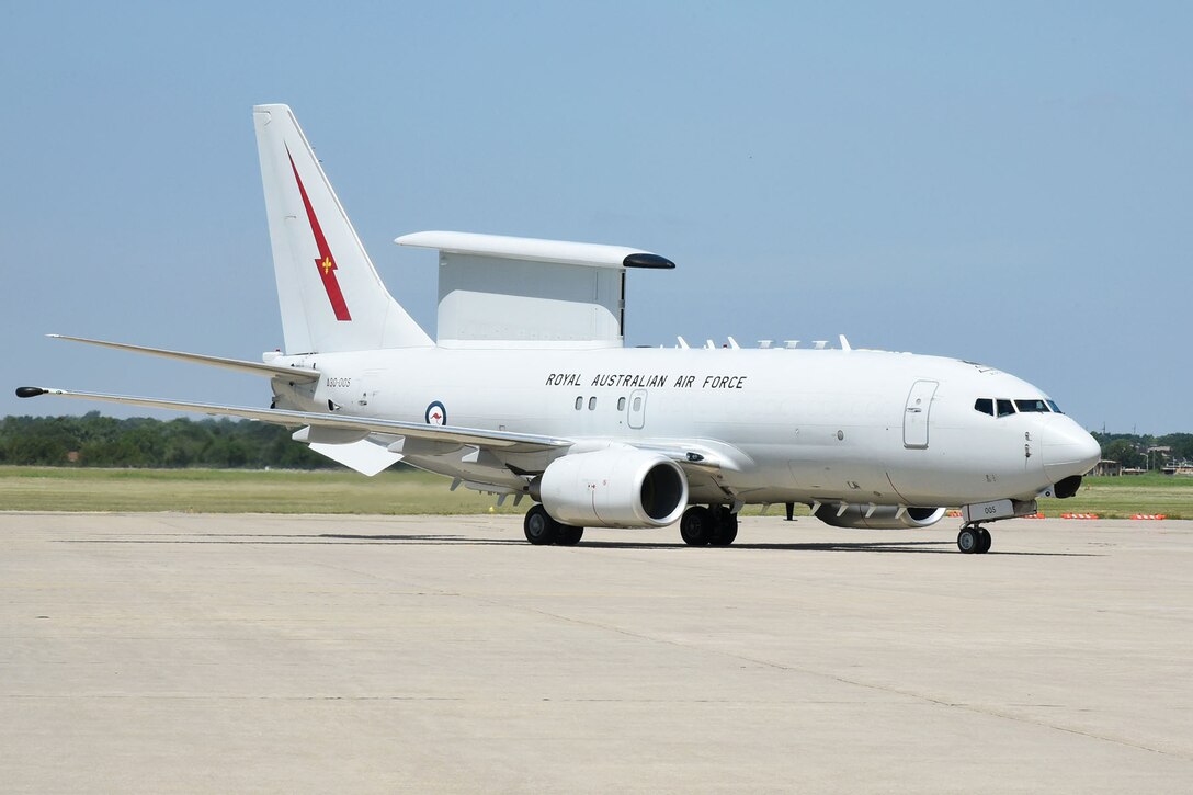 A crew from the Royal Australian Air Force flew one of their E-7A "Wedgetail" AEW&C (Airborne Early Warning and Control) aircraft into Tinker July 13. Wing Commander Mike "Mango" Bowen met with the 552nd Air Control Wing Director of Staff Lt. Col. Brian Donehue to discuss with reporters their new exchange program between the two wings.
