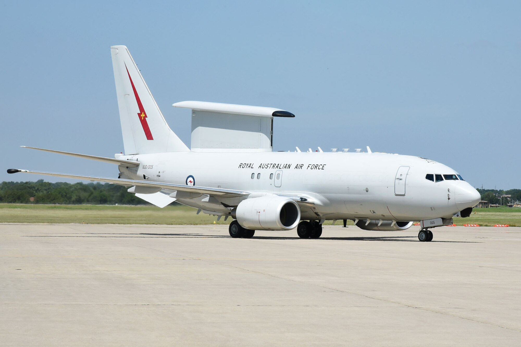 A crew from the Royal Australian Air Force flew one of their E-7A "Wedgetail" AEW&C (Airborne Early Warning and Control) aircraft into Tinker July 13. Wing Commander Mike "Mango" Bowen met with the 552nd Air Control Wing Director of Staff Lt. Col. Brian Donehue to discuss with reporters their new exchange program between the two wings.