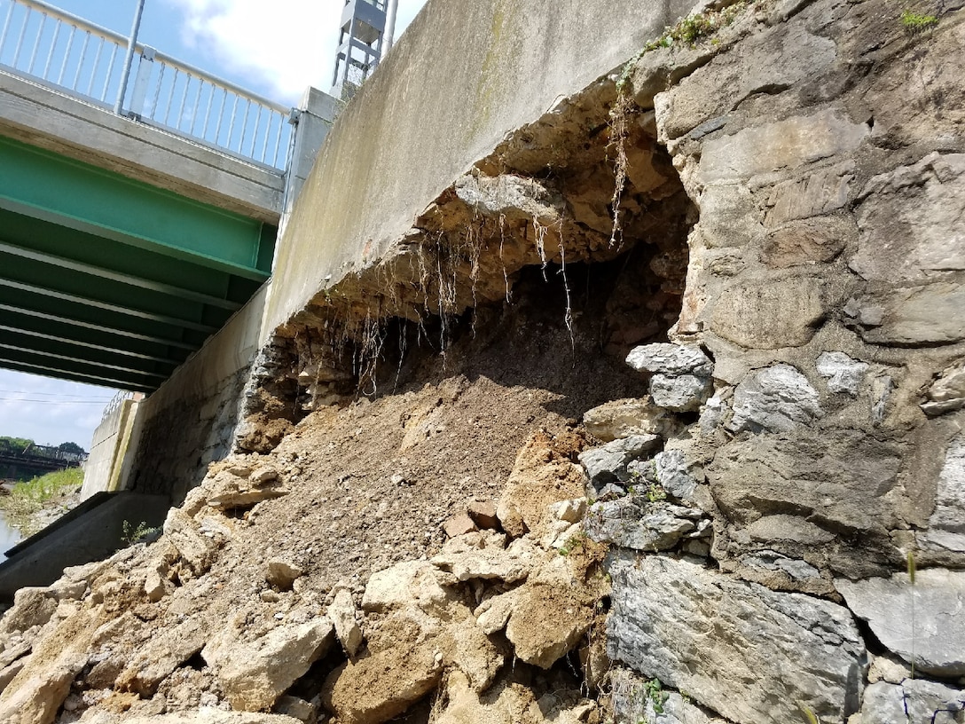 An approximately 20-foot-wide section of channel wall that collapsed into Codorus Creek immediately upstream of the Philadelphia Street Bridge in York, Pennsylvania, July 26, 2018.