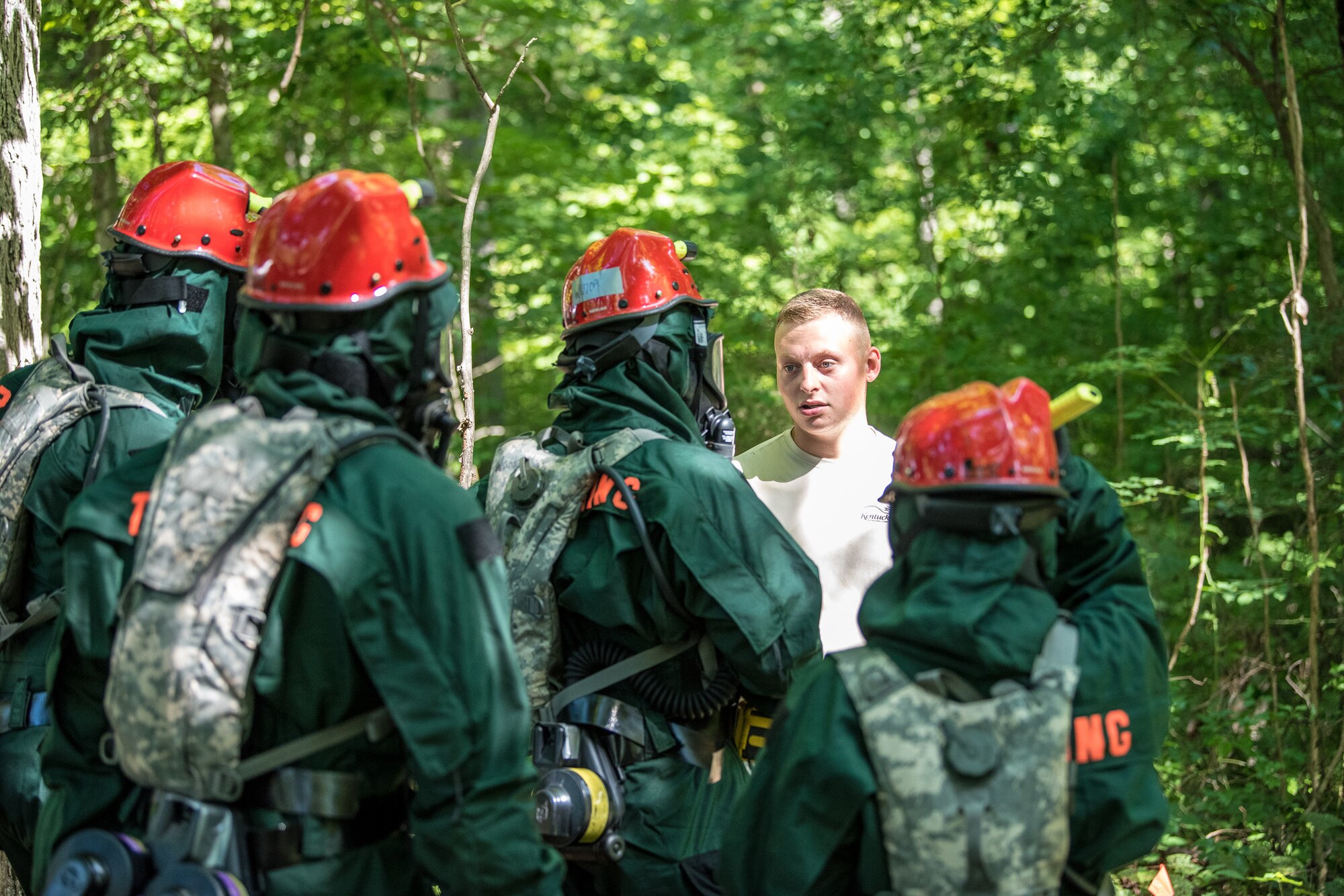 Senior Airman Parker Hale, a member of the Kentucky Air National Guard's Fatality Search and Recovery Team, briefs FSRT members before a training exercise at Rough River State Resort Park in Falls of Rough, Ky., on July 18, 2018. Thirteen members of the 123rd Airlift Wing participated in the three-day exercise to simulate the recovery and repatriation of fallen service members. (U.S. Air National Guard photo by Master Sgt. Phil Speck)