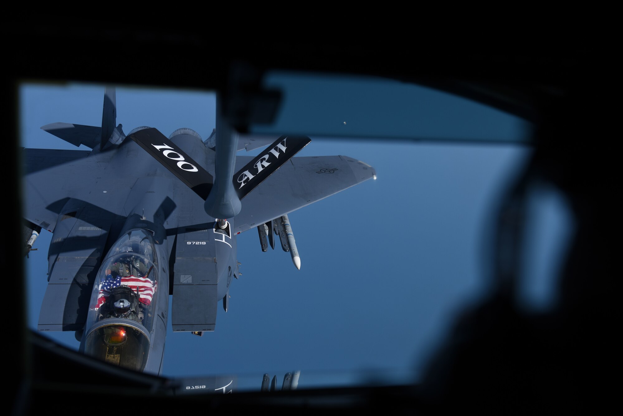 An F-15E Strike Eagle from RAF Lakenheath receives fuel from a KC-135 Stratotanker assigned to the 100th Air Refueling Wing from RAF Mildenhall over England, July 19, 2018. The F-15E was one of four to receive fuel during a routine training mission. (U.S. Air Force photo by Senior Airman Alexandra West)