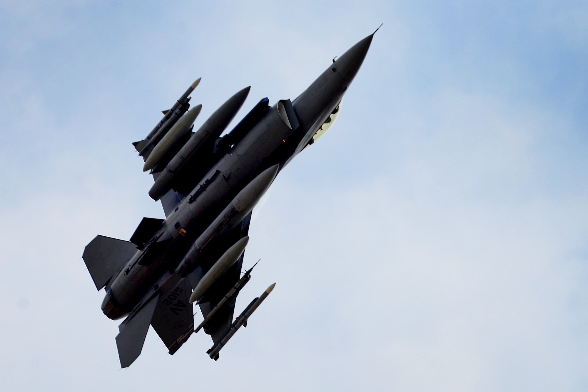 An F-16C Fighting Falcon from the 31st Fighter Wing, 510th Fighter Squadron, Aviano Air Base, Italy flies over RAF Lakenheath, England, July 20, 2018. The 510th FS are participating in a bilateral training event to enhance interoperability, maintain joint readiness and reassure regional allies and partners. (U.S. Air Force photo by Tech. Sgt. Matthew Plew)