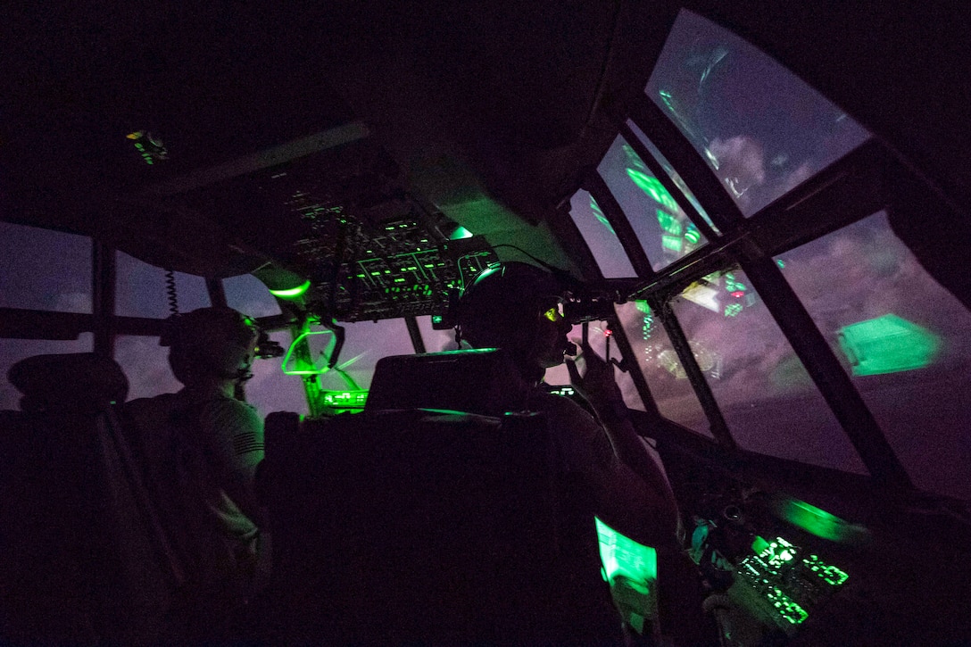 C-130J Super Hercules aircrew members assigned to the 75th Expeditionary Airlift Squadron, fly a mission over East Africa, July 24, 2018. The 75th EAS supports Combined Joint Task Force - Horn of Africa with medical evacuations, disaster relief, humanitarian and airdrop operations. (U.S. Air Force photo by Tech. Sgt. Larry E. Reid Jr.)