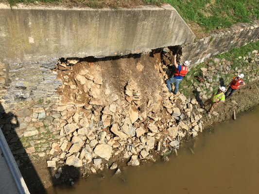A crew from the U.S. Army Corps of Engineers, Baltimore District inspects a channel wall collapse along Codorus Creek in York, Pennsylvania Thursday afternoon July 26, 2018. The masonry channel wall is part of the Codorus Creek flood risk management system that is operated and maintained by the Corps; however, the wall is not part of a floodwall or levee and the collapse does not increase flood risk to the community.