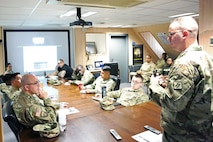 Soldiers at conference table