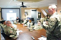 Soldiers at conference table