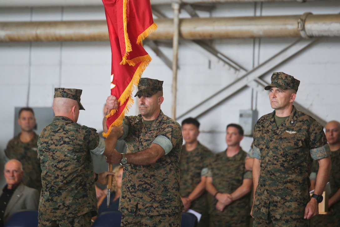 Col. Frank N. Latt relinquishes command of Marine Aircraft Group 31 to Col. Matthew H. Phares aboard Marine Corps Air Station Beaufort July 19. Latt commanded MAG-31
for 17 months before passing on the unit colors to Phares. Previously Phares was assigned to the staff of 2nd Marine Aircraft Wing.